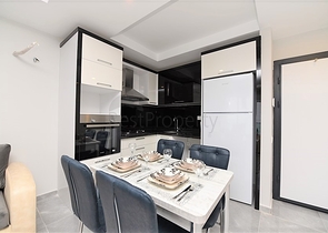 شقق غرفة وصالة مفروشة - ضمن مجمع حديث في الانيا / مهموتلار 