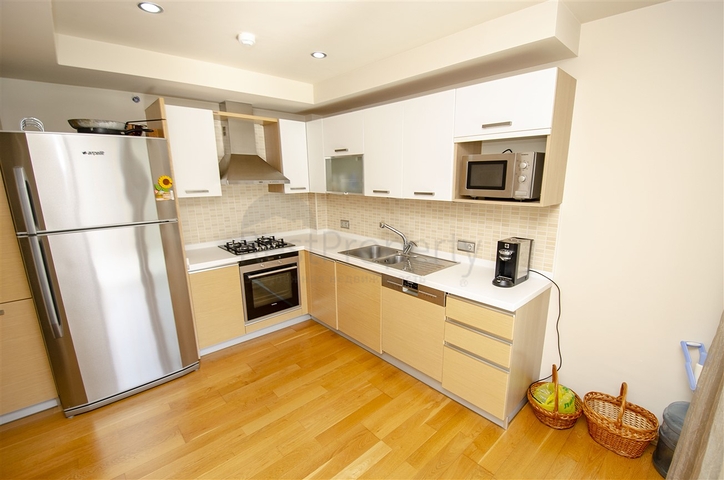 شقة 2 + 1 مع مطبخ منفصل على الصف الأول من الشاطئ في أنطاليا