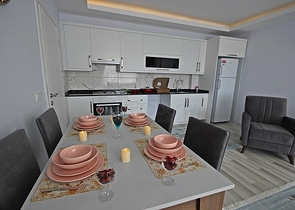 شقة غرفة وصالة مفروشة - ضمن مجمع سكني حديث - مهموتلار / الانيا 