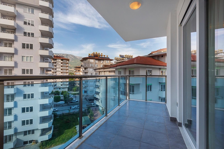 شقة غرفتين وصالة - ضمن مجمع يضم كافة الخدمات - مهموتلار/ الانيا  