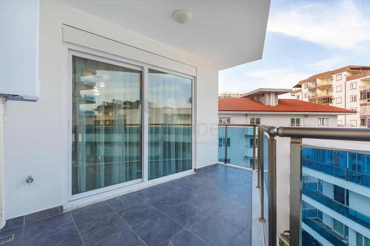 شقة غرفتين وصالة - ضمن مجمع يضم كافة الخدمات - مهموتلار/ الانيا  