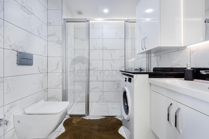 شقة غرفتين وصالة - ضمن مجمع يضم كافة الخدمات - مهموتلار/ الانيا  