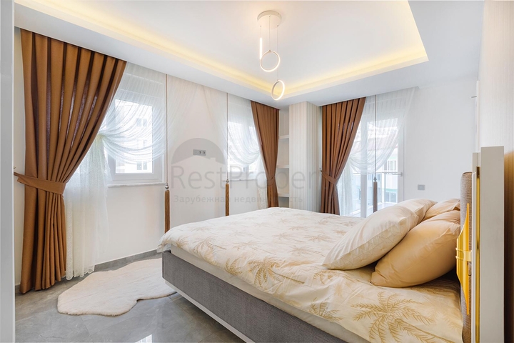 شقة غرفتين وصالة - ضمن مجمع يضم كافة الخدمات - مهموتلار/ الانيا  