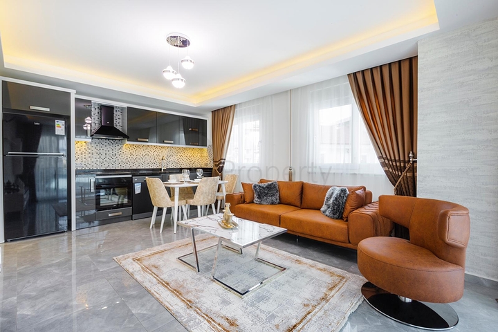 شقة غرفتين وصالة - ضمن مجمع يضم كافة الخدمات - مهموتلار/ الانيا  