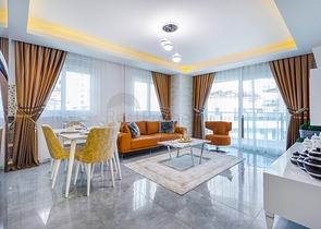 شقة غرفتين وصالة - ضمن مجمع يضم كافة الخدمات - مهموتلار/ الانيا  