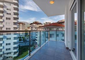 شقة غرفتين وصالة - ضمن مجمع يضم كافة الخدمات - مهموتلار/ الانيا  