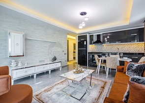 شقة غرفتين وصالة - ضمن مجمع يضم كافة الخدمات - مهموتلار/ الانيا  