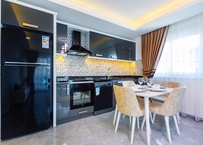 شقة غرفتين وصالة - ضمن مجمع يضم كافة الخدمات - مهموتلار/ الانيا  