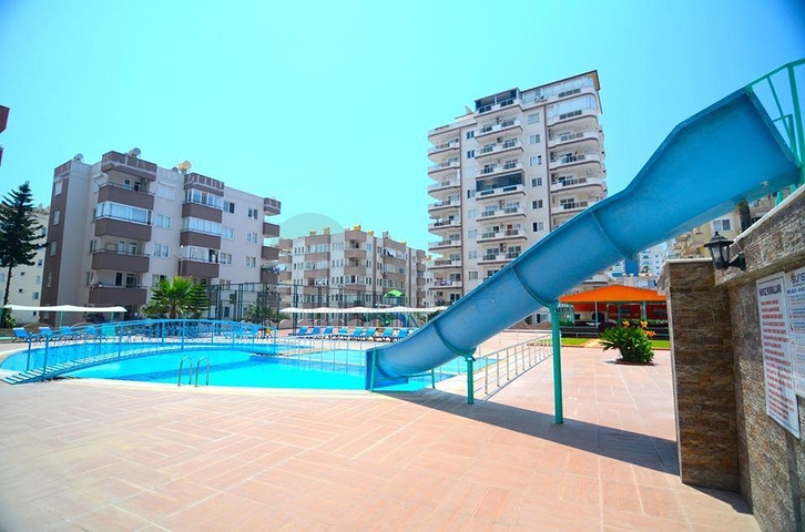 سعر اقتصادي - استديو مفروش - ضمن مجمع سكني قريب من البحر والخدمات - الانيا 