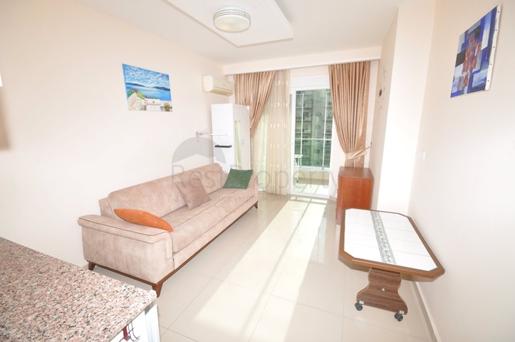 سعر اقتصادي - استديو مفروش - ضمن مجمع سكني قريب من البحر والخدمات - الانيا 