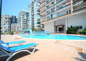 سعر اقتصادي - استديو مفروش - ضمن مجمع سكني قريب من البحر والخدمات - الانيا 