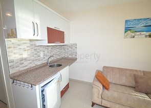 سعر اقتصادي - استديو مفروش - ضمن مجمع سكني قريب من البحر والخدمات - الانيا 