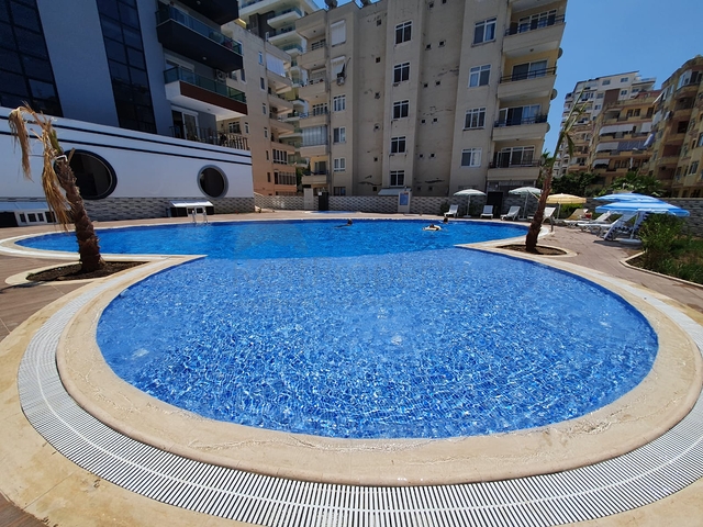 شقة غرفة وصالة - مجمع سكني حديث يضم كافة الخدمات - مهموتلار / الانيا 