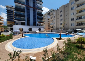 شقة غرفة وصالة - مجمع سكني حديث يضم كافة الخدمات - مهموتلار / الانيا 