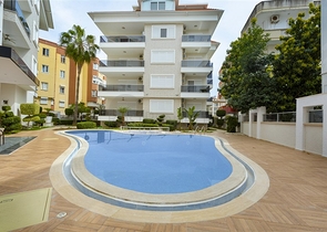 منطقة راقية - شقة واسعة من تصميم غرفة وصالة - مجمع انيق - اوبا / الانيا 