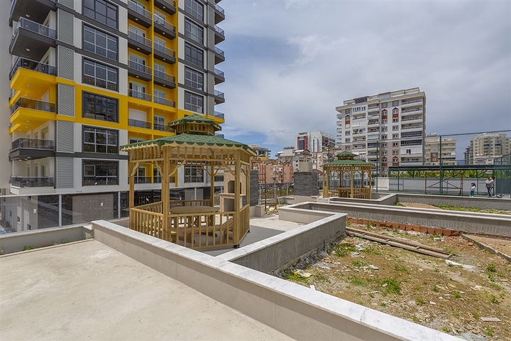 شقة عائلية  -4 غرف وصالة- مطبخ منفصل - مجمع سكني حديث - مهموتلار /الانيا 