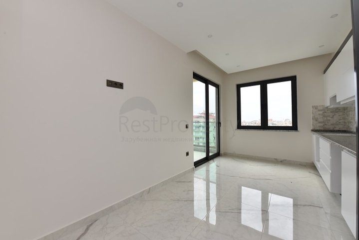 شقة 3 غرف وصالة - مطبخ منفصل - مجمع حديث في مركز الانيا 