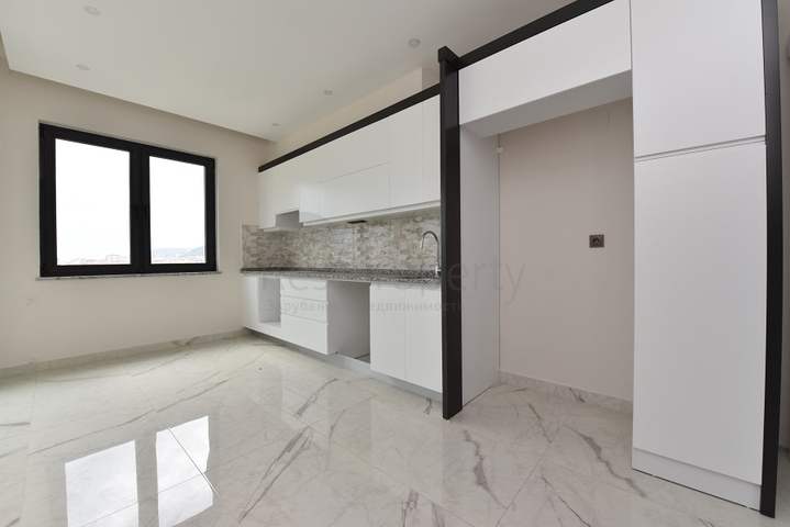 شقة 3 غرف وصالة - مطبخ منفصل - مجمع حديث في مركز الانيا 