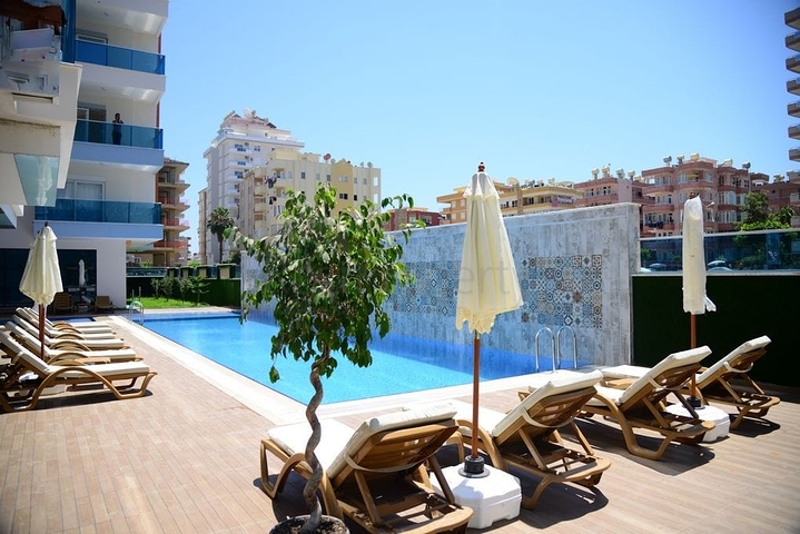 مجمع سكني حديث وقريب من البحر - شقة واسعة 1+1 - مفروشة - في مهموتلار / الانيا 