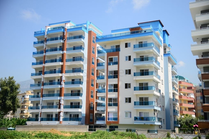 مجمع سكني حديث وقريب من البحر - شقة واسعة 1+1 - مفروشة - في مهموتلار / الانيا 