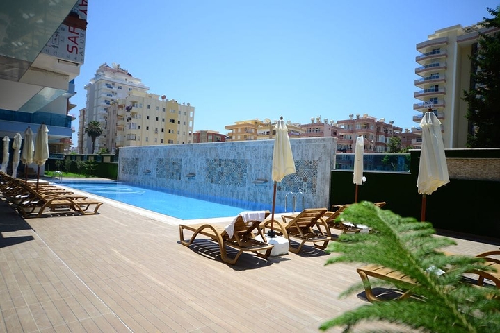 مجمع سكني حديث وقريب من البحر - شقة واسعة 1+1 - مفروشة - في مهموتلار / الانيا 