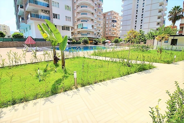 طابق مرتفع- اطلالة بحر - شقة غرفة وصالة ضمن مجمع حديث - مهموتلار / الانيا 