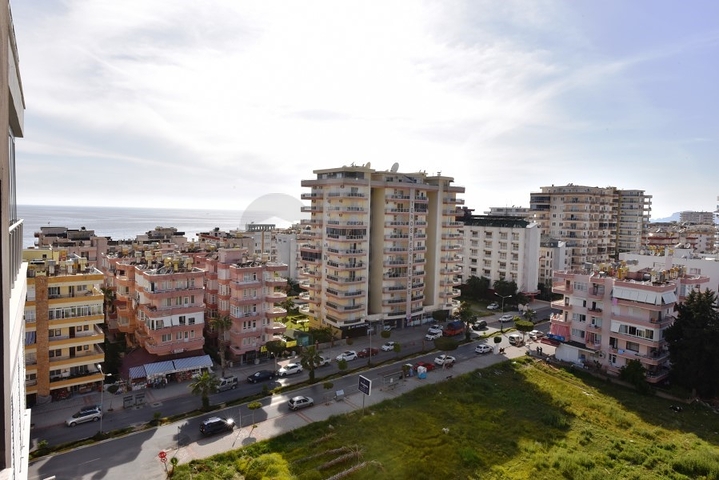 طابق مرتفع- اطلالة بحر - شقة غرفة وصالة ضمن مجمع حديث - مهموتلار / الانيا 