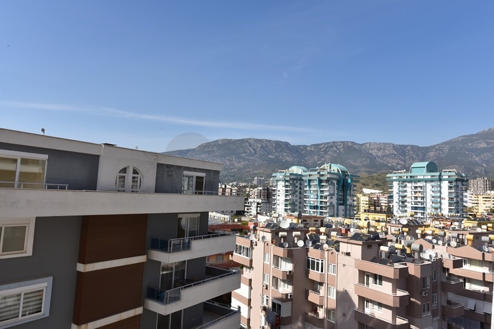 طابق مرتفع- اطلالة بحر - شقة غرفة وصالة ضمن مجمع حديث - مهموتلار / الانيا 