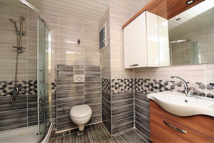 طابق مرتفع- اطلالة بحر - شقة غرفة وصالة ضمن مجمع حديث - مهموتلار / الانيا 