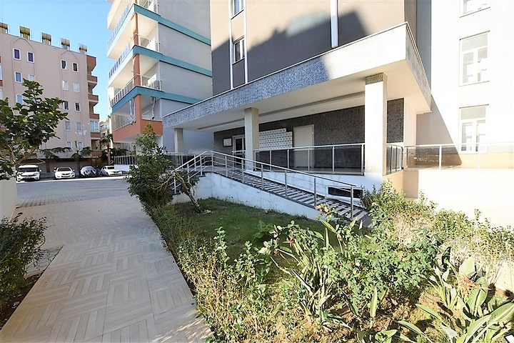 طابق مرتفع- اطلالة بحر - شقة غرفة وصالة ضمن مجمع حديث - مهموتلار / الانيا 