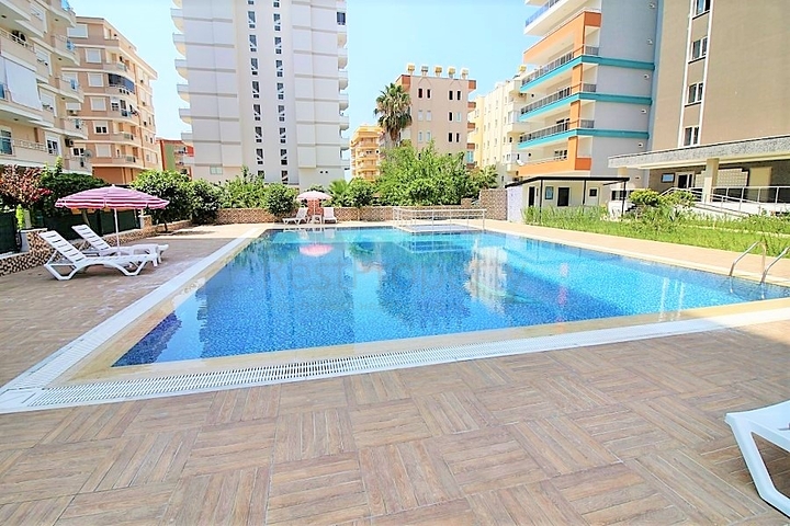 طابق مرتفع- اطلالة بحر - شقة غرفة وصالة ضمن مجمع حديث - مهموتلار / الانيا 