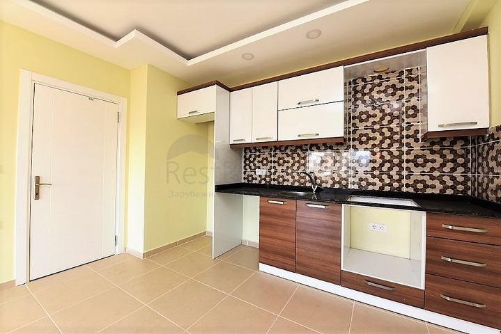 طابق مرتفع- اطلالة بحر - شقة غرفة وصالة ضمن مجمع حديث - مهموتلار / الانيا 