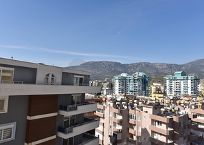 طابق مرتفع- اطلالة بحر - شقة غرفة وصالة ضمن مجمع حديث - مهموتلار / الانيا 