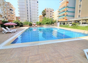 طابق مرتفع- اطلالة بحر - شقة غرفة وصالة ضمن مجمع حديث - مهموتلار / الانيا 