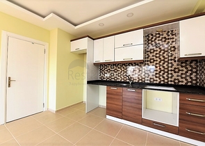 طابق مرتفع- اطلالة بحر - شقة غرفة وصالة ضمن مجمع حديث - مهموتلار / الانيا 