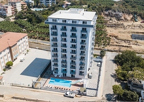 شقق 1+1 ضمن مجمع سكني حديث - مهموتلار / الانيا 