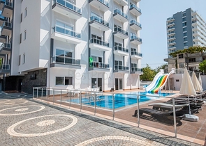 شقق 1+1 ضمن مجمع سكني حديث - مهموتلار / الانيا 