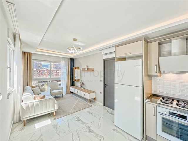 قريب من البحر - بالاقساط - مجمع عائلي حديث قيد الانشاء - مهموتلار / الانيا 