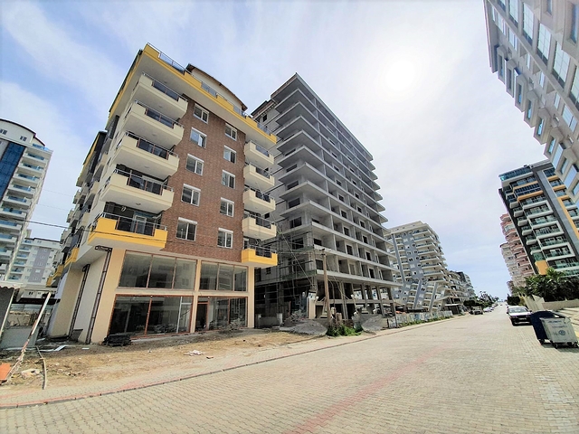 شقق ضمن مجمع سكني جديد - قريب من البحر - مهموتلار / الانيا 