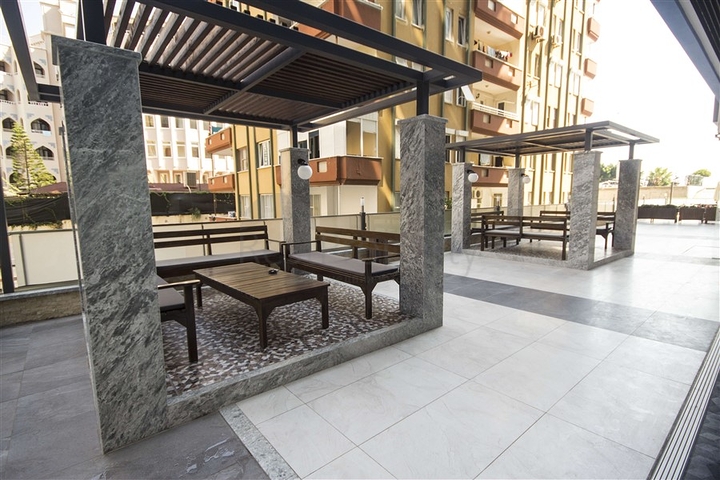 اول صف على البحر - شقة 2 غرفة وصالة - مجمع حديث -مهموتلار / الانيا 