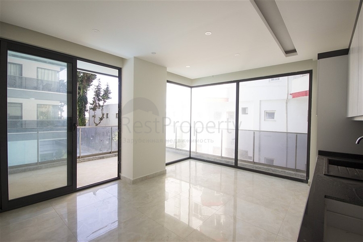 اول صف على البحر - شقة 2 غرفة وصالة - مجمع حديث -مهموتلار / الانيا 