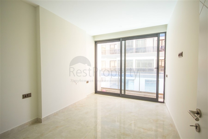 اول صف على البحر - شقة 2 غرفة وصالة - مجمع حديث -مهموتلار / الانيا 