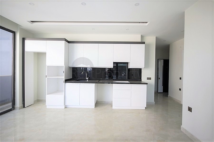 اول صف على البحر - شقة 2 غرفة وصالة - مجمع حديث -مهموتلار / الانيا 