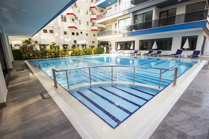 اول صف على البحر - شقة 2 غرفة وصالة - مجمع حديث -مهموتلار / الانيا 