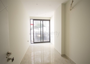 اول صف على البحر - شقة 2 غرفة وصالة - مجمع حديث -مهموتلار / الانيا 