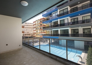 اول صف على البحر - شقة 2 غرفة وصالة - مجمع حديث -مهموتلار / الانيا 