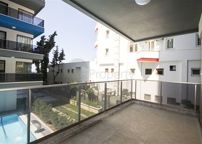 اول صف على البحر - شقة 2 غرفة وصالة - مجمع حديث -مهموتلار / الانيا 