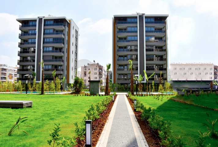 مشروع استثماري في منطقة غوزالوبا لارا 5 دقائق من الشاطئ