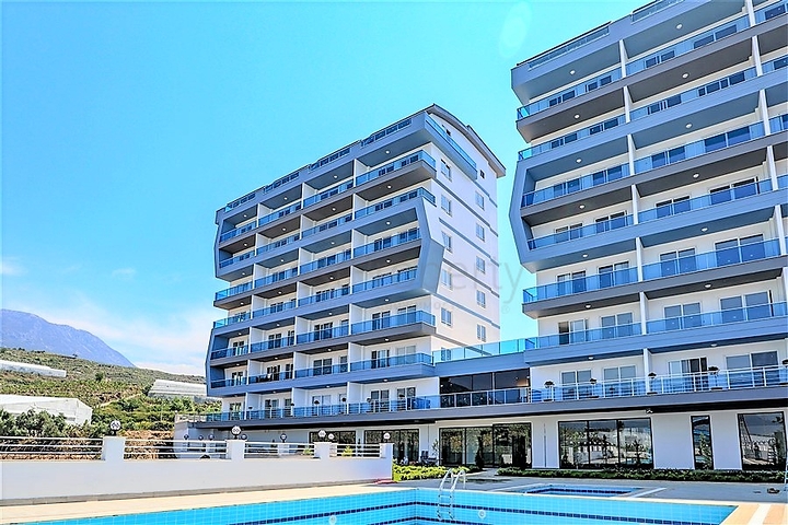 منطقة هادئة - مجمع حديث - اطلالات ساحرة -شقة 1+1 -في مهموتلار / الانيا 