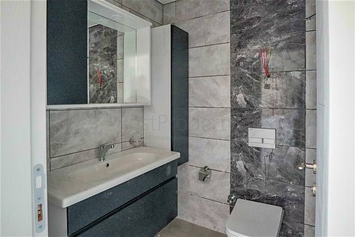 منطقة هادئة - مجمع حديث - اطلالات ساحرة -شقة 1+1 -في مهموتلار / الانيا 